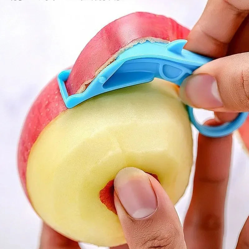 epluche pomme tranchant